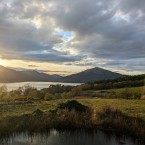 Scottish mountains and lake at dusk